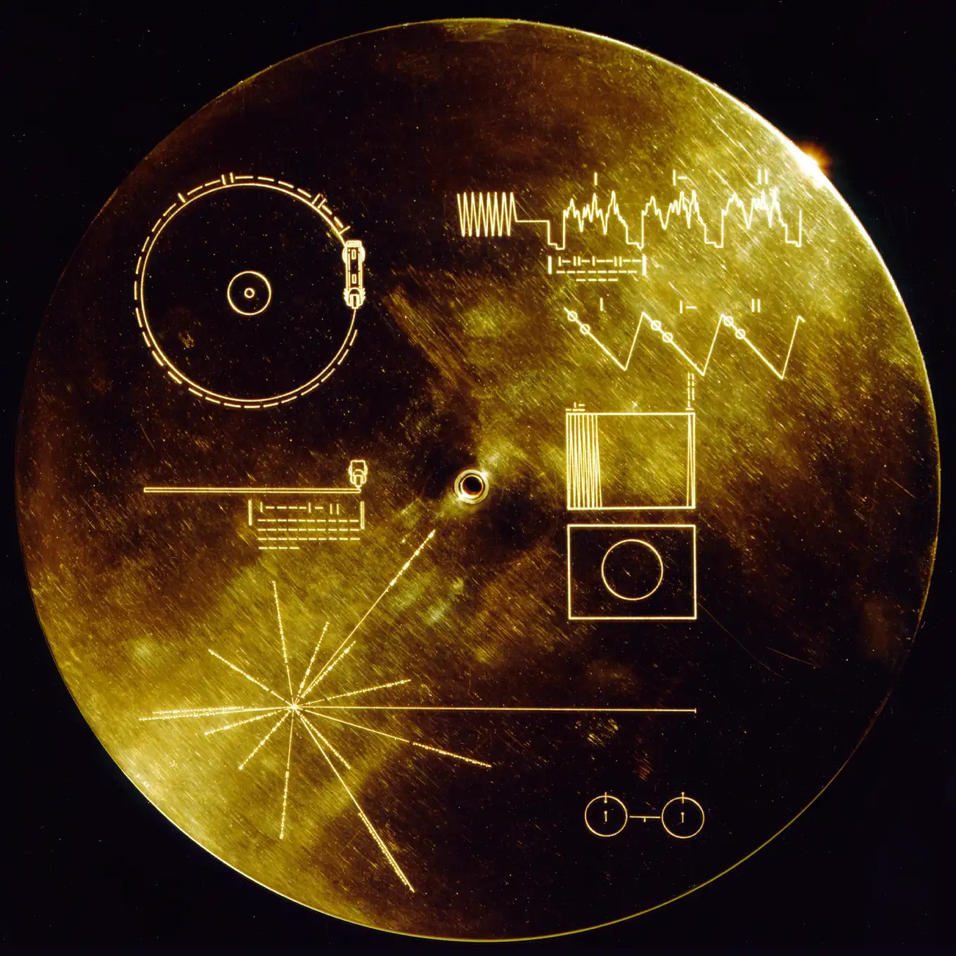 The Voyager Golden Record, a gold-plated copper disk carrying sounds and images of life on Earth